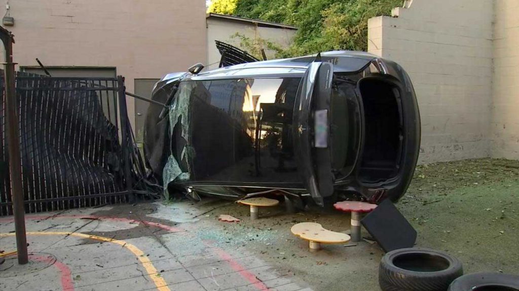Tesla Driver Walks Away After Huge 40-Foot Tumble Down Embankment Into ...