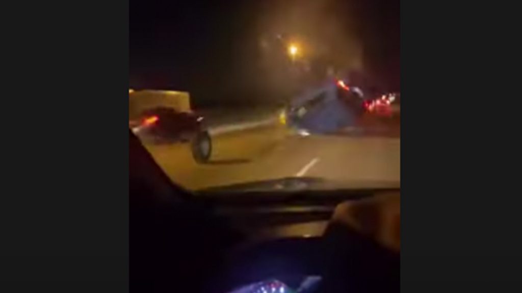 RAV4 Runs Over Runaway Truck Tire Before Flipping Down The Highway