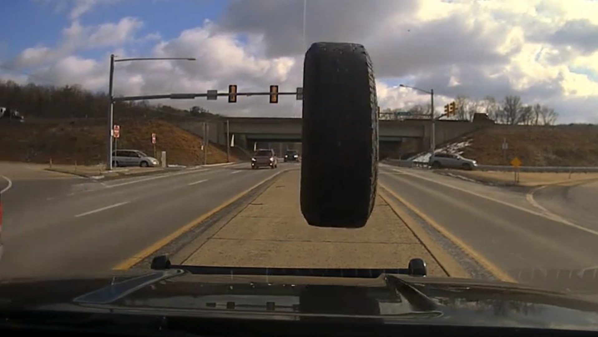 Video Shows Runaway Tire Smashing Into Police Cruiser Windshield