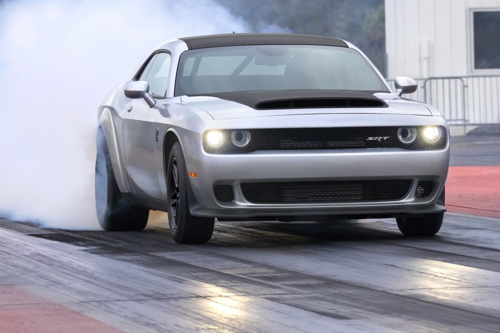 The 2023 Dodge Challenger SRT Demon performing a burnout on the drag strip