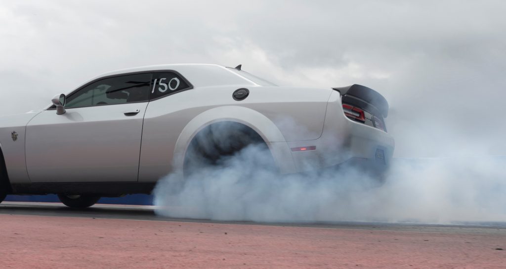 The 2023 Dodge Challenger SRT Demon performing a burnout on the drag strip