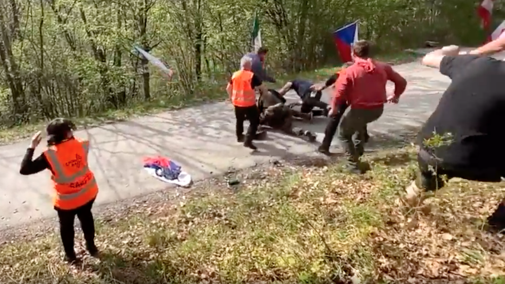 Fighting spectators on an active WRC track