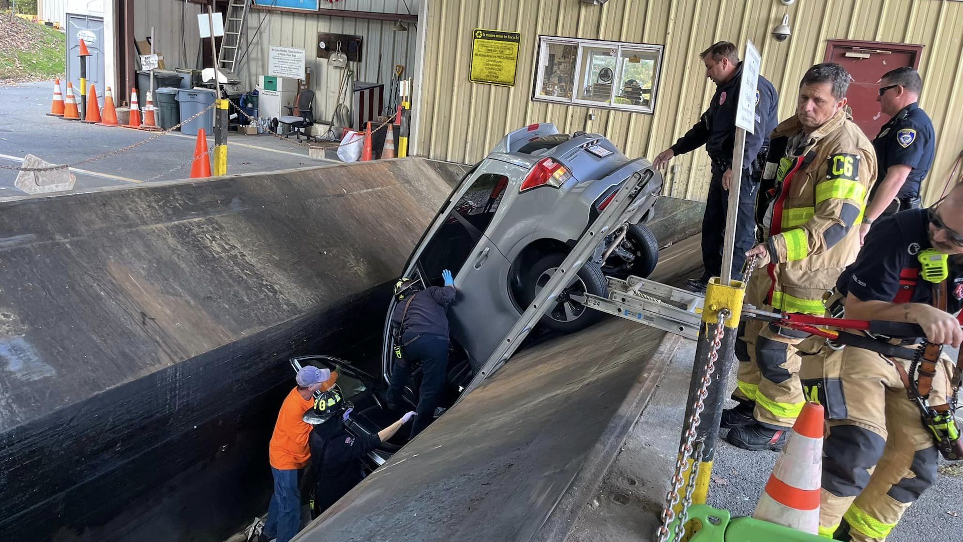 Woman Accidentally Drives Her Subaru Forester Into A Trash Compactor