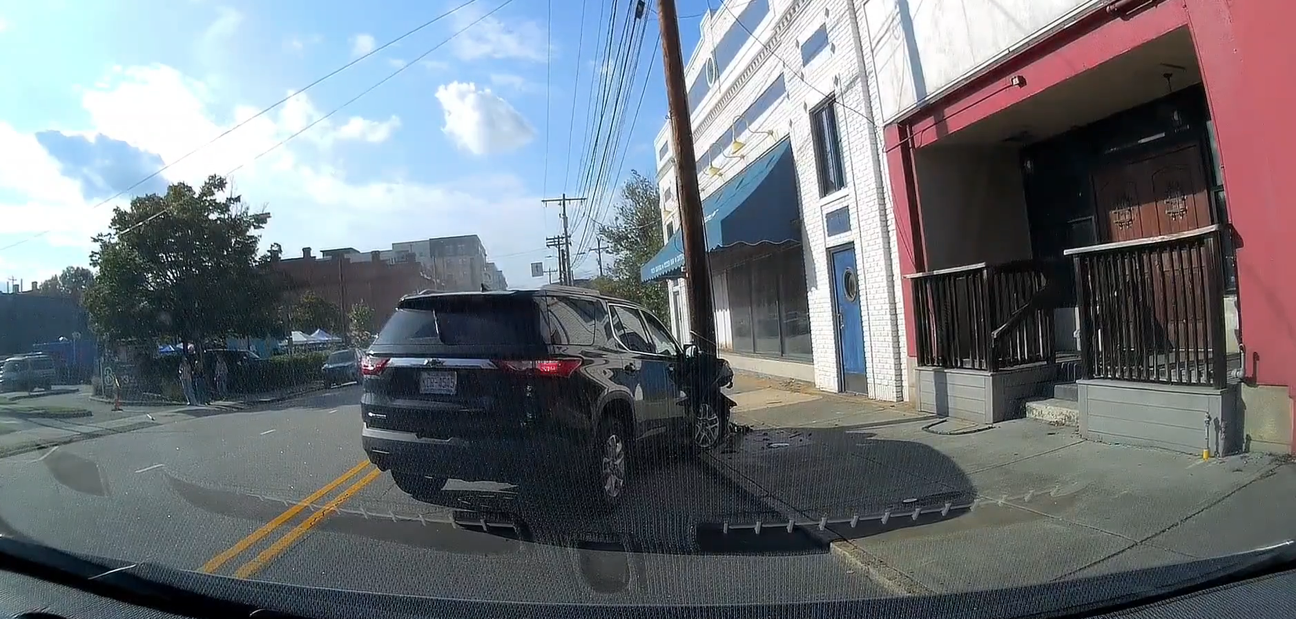 Dodging Traffic or Dodging the Truth? Chevy Collides with Light Pole in ...